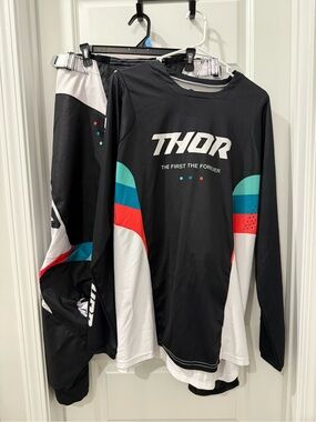 thor Black Motocross Jersey & Pants with Teal and Red Accents